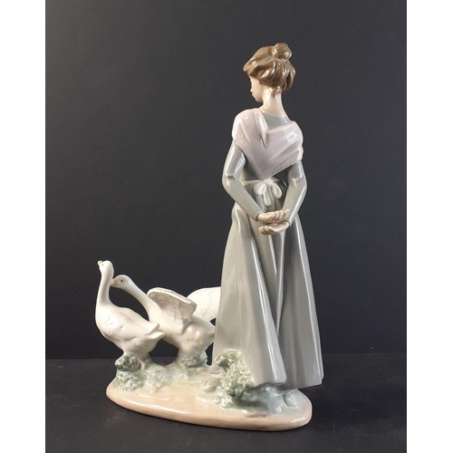 360 - A rather lovely LLADRO girl with 2 geese standing 24cm approx#360