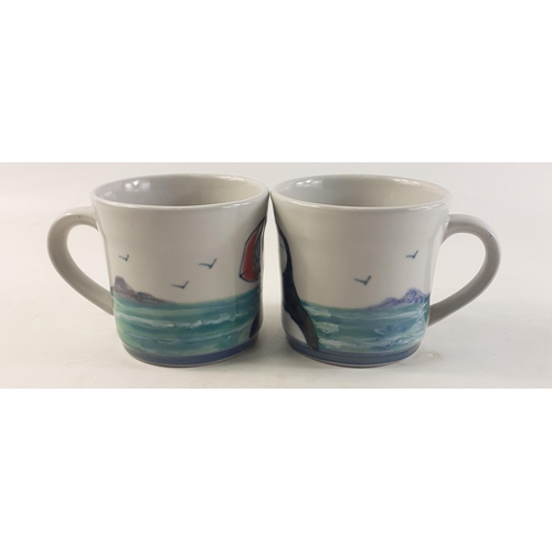 363 - HIGHLAND STONEWARE Two lovely puffin mugs in good condition. Lovely things!#363