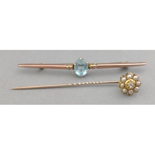 39 - A 15ct stamped stick pin brooch with seed pearls and a small diamond (tested) - gross weight 1.59g a... 