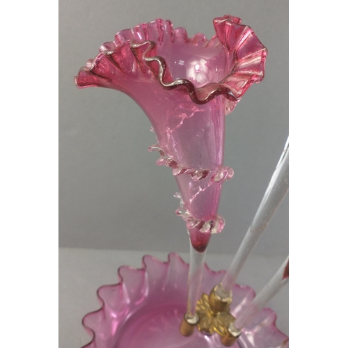 390 - A stylish EPERGNE with crimped cranberry glass edges. All pieces in good condition. A lovely piece.
... 