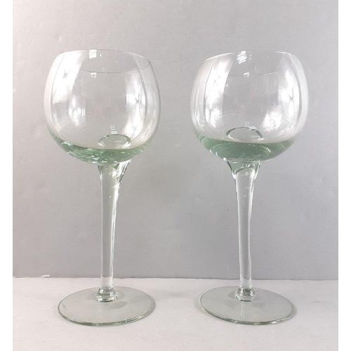 412 - Two very unusual and attractive large wine glasses with offset stems. Each 20cm tall approx.#412