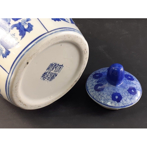 425 - Attractive Oriental blue and white lidded jar in good condition. 27cm tall.#425