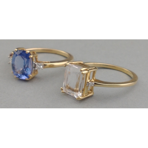 47 - A 585 stamped JAIPUR precious stones ring with a large SAPPHIRE inset supported by two small diamond... 