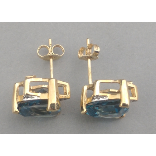 48 - A pair of 375 stamped LARGE JAIPUR INDIAN SAPPHIRE and small diamond (tested) stud earrings in a sta... 