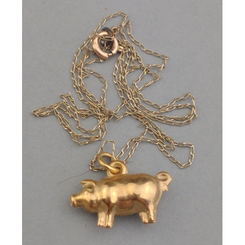 5 - A 375 stamped gold hallmarked pig charm by WJP.  Weighs 0.6g approx on unmarked small thin yellow me... 