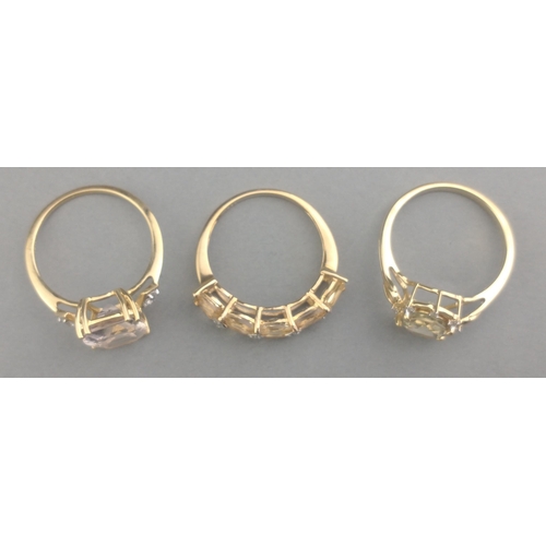 54 - Three SUBSTANTIAL 375 stamped rings with clear stones all rings size O and gross weight 7.22g approx... 