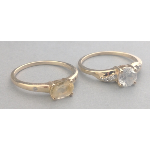 55 - Two 375 stamped rings with clear stones both size O, gross total weight 3.91g approx#55