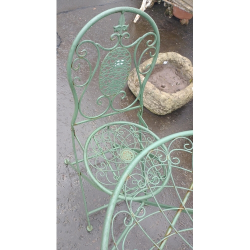 568 - Small metal garden table with 2 chairs in attractive green colour.  Table height approx 70cm#568