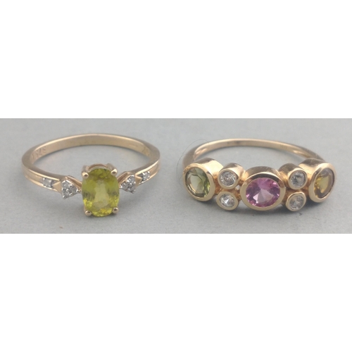 58 - Two 375 stamped rings one with a PERIDOT centred stone the other ring with coloured stones - ring si... 