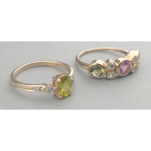 58 - Two 375 stamped rings one with a PERIDOT centred stone the other ring with coloured stones - ring si... 