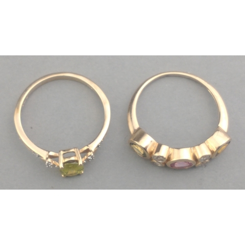 58 - Two 375 stamped rings one with a PERIDOT centred stone the other ring with coloured stones - ring si... 