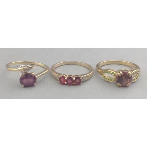 59 - A collection of three rings stamped 375 with quality light purple amethyst stones - total gross weig... 