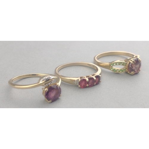 59 - A collection of three rings stamped 375 with quality light purple amethyst stones - total gross weig... 