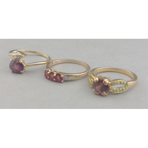 59 - A collection of three rings stamped 375 with quality light purple amethyst stones - total gross weig... 