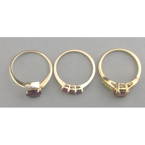 59 - A collection of three rings stamped 375 with quality light purple amethyst stones - total gross weig... 