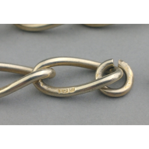 6 - UMMM A link chain with two Albert bars all carrying 9ct stamps. Also two 9ct stanmped studs. Total g... 