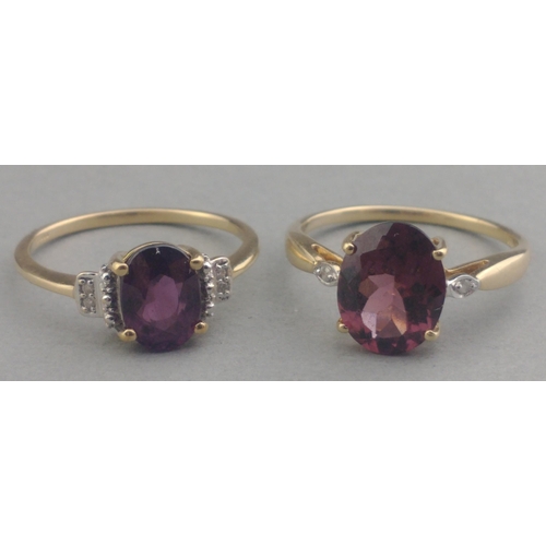 60 - Two 375 stamped hallmarked large oval purple AMAZING AMETHYST centred rings - ring sizes both O and ... 