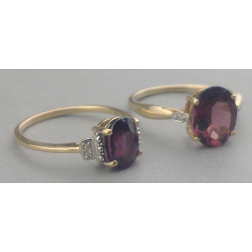 60 - Two 375 stamped hallmarked large oval purple AMAZING AMETHYST centred rings - ring sizes both O and ... 