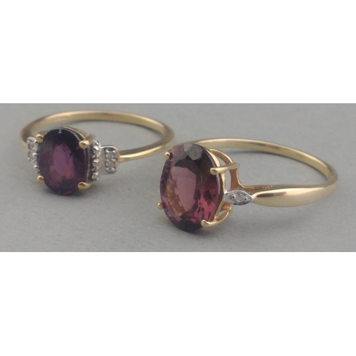 60 - Two 375 stamped hallmarked large oval purple AMAZING AMETHYST centred rings - ring sizes both O and ... 