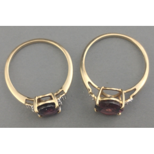 60 - Two 375 stamped hallmarked large oval purple AMAZING AMETHYST centred rings - ring sizes both O and ... 