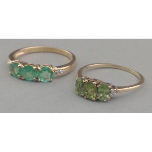 61 - Two 375 stamped PERIDOT triple stone rings both size O - both 3.30g total gross weight#61