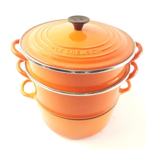 612 - A volcanic orange LE CREUSET casserole dish size 22cm with some wear, plus other 2 stacking pots, on... 