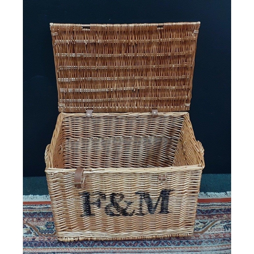 623 - A large FORTNUM & MASON wicker basket with leather straps, measuring 58 x 40 x 40cm approx#623... 