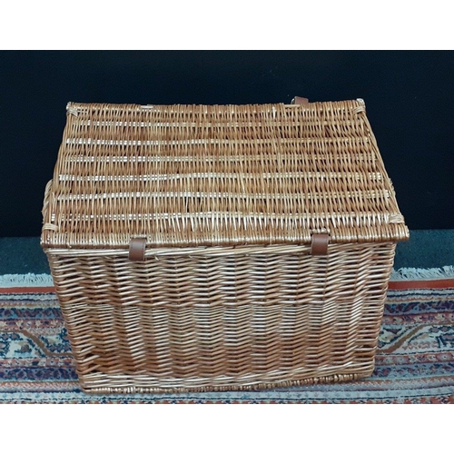 623 - A large FORTNUM & MASON wicker basket with leather straps, measuring 58 x 40 x 40cm approx#623... 