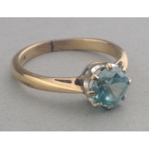 66 - A 9ct stamped ring with a Jaipur blue centre stone Size I. Gross weight 2.05g approx.#66