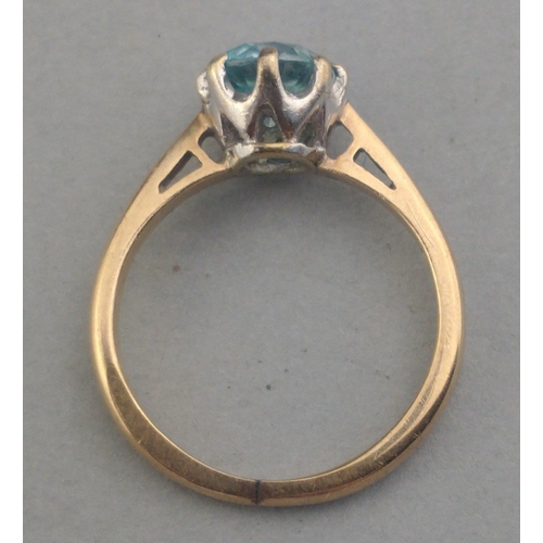 66 - A 9ct stamped ring with a Jaipur blue centre stone Size I. Gross weight 2.05g approx.#66