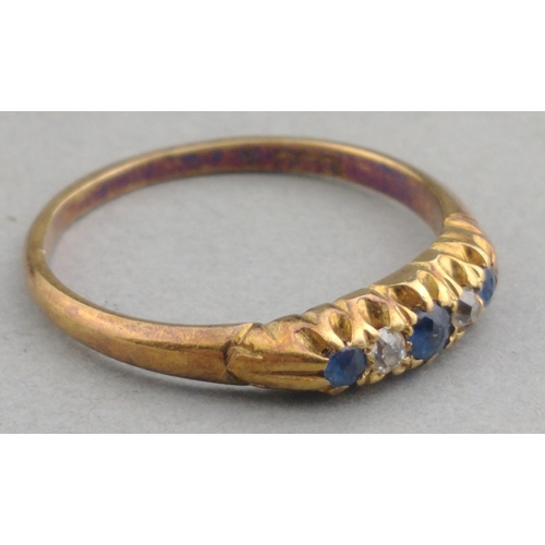 70 - Gold ring 18ct band with diamonds and three sapphires. Size N, gross weight 2.5g approx.#70