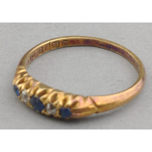 70 - Gold ring 18ct band with diamonds and three sapphires. Size N, gross weight 2.5g approx.#70