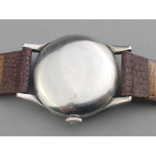 91 - A VINTAGE OMEGA BUMPER non-magnetic wristwatch with brown leather strap - not working at time of val... 