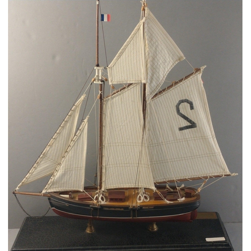 317 - A desktop model of a sailing ship on plinth.  NEW YORK PILOT BOAT PHANTOM 1868.  53cm plinth and mod... 