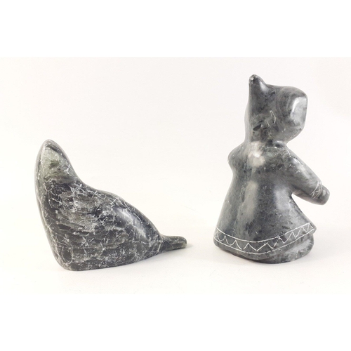 352 - Two attractive Inuit style decorative pieces.  An Inuit figure 10cm approx signed to base and a walr... 