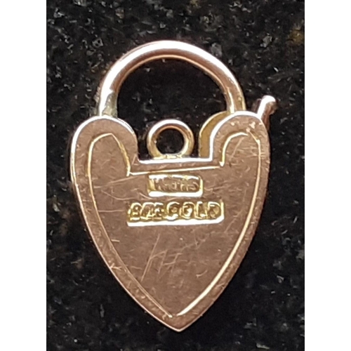 39D - A 375 stamped heart-shaped lock - weight 1.24g approx - dimension 1.5cm x 1cm approx#53
