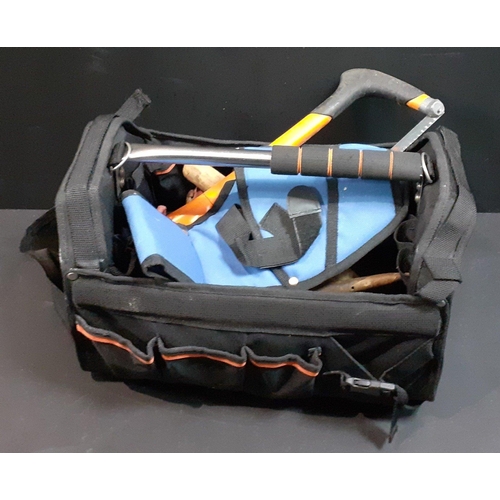 143 - A handyman's sturdy canvas tool bag with a selection of tools#189