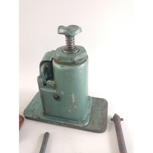 147 - A mixed lot containing three bottle jacks, hand starter etc.#193