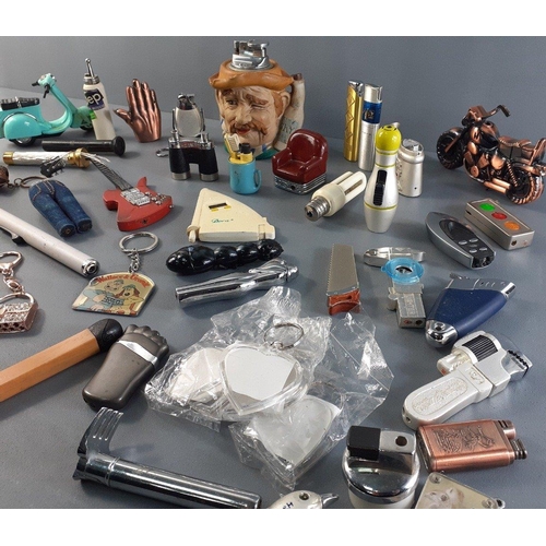 169 - A large quantity of novelty lighters in shape of tools, binoculars, motorbikes, lightbulb, bowling b... 