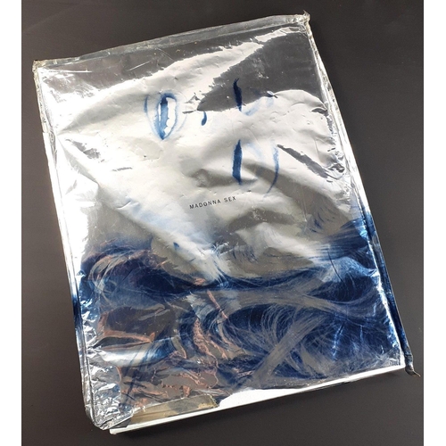 176 - MADONNA SEX Metal board covers in foil slip.  Wear to foil but internally good.#222
