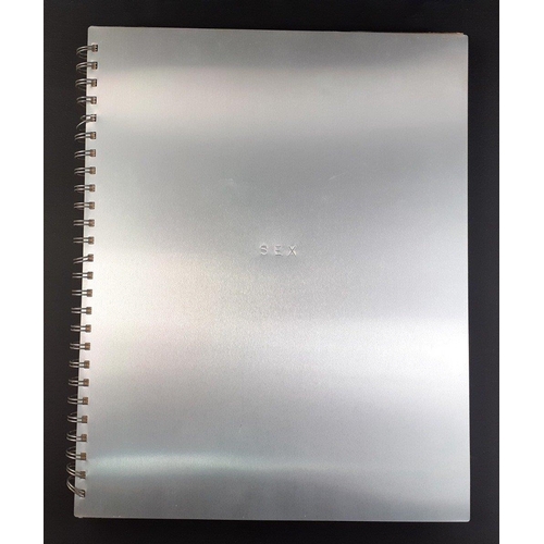 176 - MADONNA SEX Metal board covers in foil slip.  Wear to foil but internally good.#222
