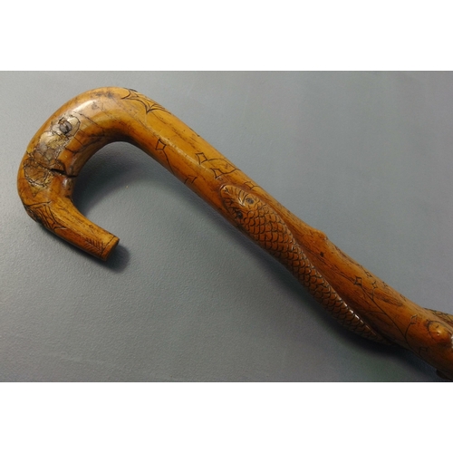 183 - An INTERESTING hand carved wooden snake or serpent walking stick - length 38