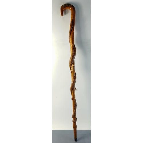 183 - An INTERESTING hand carved wooden snake or serpent walking stick - length 38