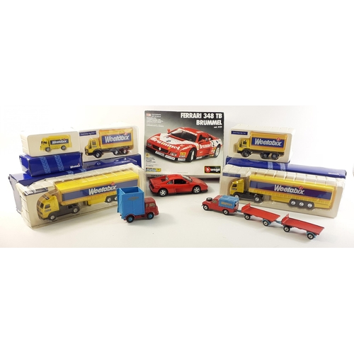 189 - A small collection of boxed WEETABIX cars to include a Ford Cargo Box Van x 2, a Leyland Truck , an ... 