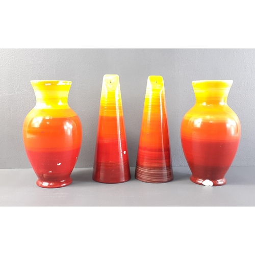 213 - Four pieces of EMILIO JAMES pottery painted in the Shelley style comprising salt & pepper and 2 ... 