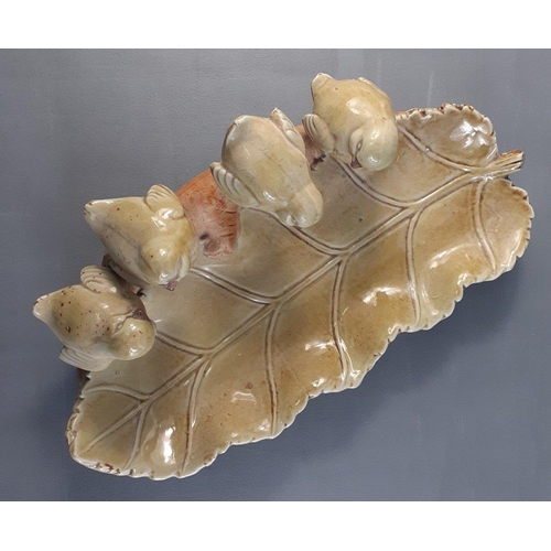 214 - A cute pottery dish with 4 wee birds perched along the edge.  Measures 39cm approx.  No damage noted... 