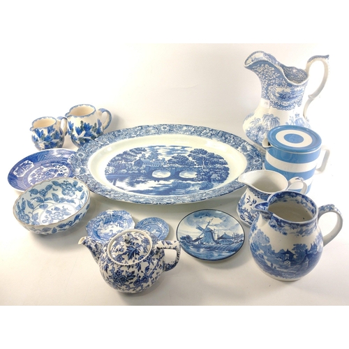 215 - A box of mainly blue and white china to include jugs, a Cornishware milk jug etc#261