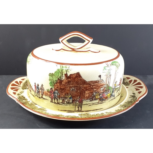227 - An antique ROYAL DOULTON cheese / butter lidded dish with elaborate village scene decoration.  Age r... 