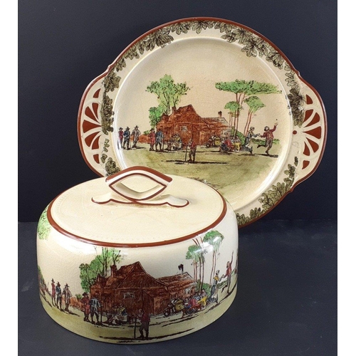 227 - An antique ROYAL DOULTON cheese / butter lidded dish with elaborate village scene decoration.  Age r... 