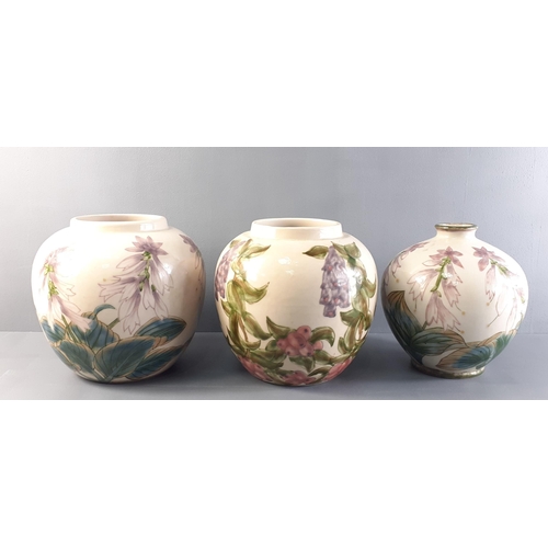 228 - Three COBRIDGE STONEWARE foxglove vases, tallest standing 19cm approx.  No damage#276